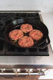 An Image Of Four Meatloaf Patties Pan Frying In A Skillet On The Stove Meatloaf Burgers Meatloaf Patties Hamburger Recipes Patty