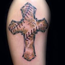 If you are looking for a tattoo that represents your love for the sport of baseball, then look no further than this article. 20 Baseball Cross Tattoo Designs For Men Religious Ink Ideas