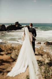 Our collection includes lightweight standard and plus size wedding dresses for the beach, so you can stay comfortable no matter the weather—and maybe even dip your toes into the waves! Vintage Inspired Cannon Beach Wedding With Evergreen Details Junebug Weddings