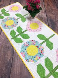Brighten Your Table With This Charming Runner Quilting Digest Spring Table Runner Quilted Table Runners Patterns Hanging Quilts