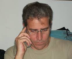 John Peat, Toronto Painters. This is John on the phone writing down a customers information. - John_Peat