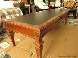 The grey wood pattern and the black wood give this table a modern and stylish look. How To Re Invent Your Old Coffee Table With Paint The Boondocks Blog