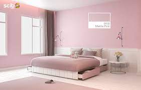 Dependable, versatile, warm, and subtle, it's one of the best paint colors for a bedroom. A Big Bed With Drawers For Storage And A Side Table With A Flower Vase On Top In Front Of A Roo Pink Bedroom Walls Bedroom Wall Paint Colors Pink Painted