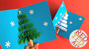 Glue the hill to the greeting card, then glue the building into place on the card, and lastly glue the person into place on the card. Diy Pop Up Christmas Card Youtube