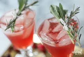 In a glass filled with ice, add the bourbon, cranberry juice, rosemary sage simple syrup, and a splash of lemon juice. Cranberry Bourbon Cocktail