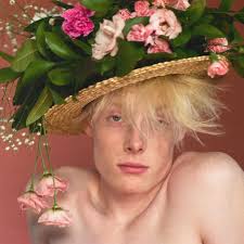 Ned in floral celebration hat' photographed by David Sims for Loewe.  London, 2024⁠ ⁠ @davidsimsofficial