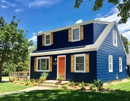 Another red brick home with dark shutters. Navy House White Trim Cedar Shutters House Exterior Blue Navy House Exterior Cape House Exterior