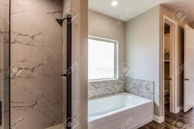 The garden tubs make peaceful environment of your garden. Privacy Fogged Window Over Garden Tub Stock Photo Picture And Royalty Free Image Image 147042454