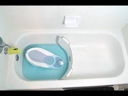 The 'babydam' works by being positioned in a tub in order to block off an area that will be filled with water and the other that won't. Invention A Day Episode 304 The Baby Bath Divider Youtube