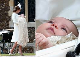 În reflexia unui geam de la o uşă se pot vedea cei doi duci. Botezul Printesei Charlotte Cum A Fost La Eveniment