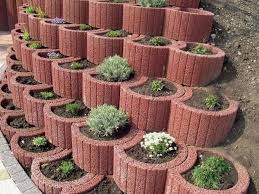 Create a living wall of sorts by stacking them up and adding soil and succulents. Retaining Wall Ideas Cinder Block Concrete Planters Garden Decor Pflanzen Gartenstruktur Garten