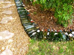 10 Things I Don T Throw Out I Reuse Wine Bottle Garden Bottle Garden Garden Borders