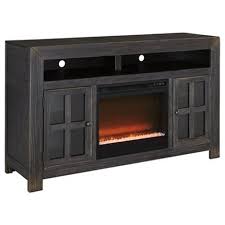 The electric fireplace sector is constantly booming, making improvements and variations, mastering their portability is the keystone of the electric fireplace insert's appeal. Signature Design By Ashley Gavelston Distressed Black Large Tv Stand With Electric Fireplace Unit Royal Furniture Tv Stands