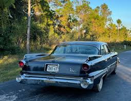 Image result for Teal 1960 Dart