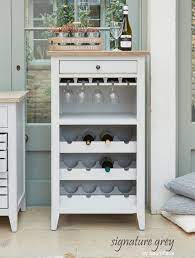 Rounding out the design, side shelving is perfect for displaying spirits and mixers, while the tabletop provides a perfect platform for crafting cocktails. Baumhaus Signature Grey Wine Rack Glass Storage Cabinet Bargain Oak