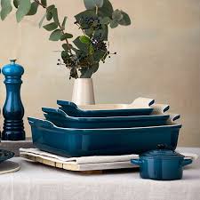 Le creuset's newest line of stoneware features improved performance and contemporary design. Le Creuset Deep Teal Stoneware Small 19cm Heritage Rectangular Dish 71102196420001 Harts Of Stur