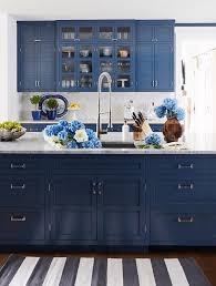 After the previously glazed kitchen cabinets have been sanded and cleaned, the primer coat can be applied. Must Know Tips For Painting Kitchen Cabinets Better Homes Gardens
