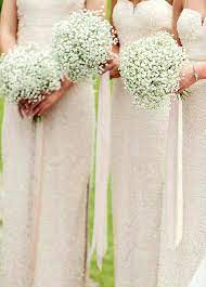 Bridesmaid S Beautiful Wedding Bouquets Of White Gypsophila Baby S Breath Gypsophila Wedding Wedding Flowers Bridesmaid Flowers