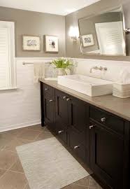 On the floors, carrara venato 2 octagon polished mosaic tile, on the walls, white glass subway tile with rope trim, and finally, on the shower and recessed shelf, carrara bianco polished 3 hexagon marble mosaic tile. Brushed Nickel Wall Tiles Brushed Nickel Hardware Dark Wood Cabinets French Subway Tile Back Traditional Bathroom Bathrooms Remodel Home Decor