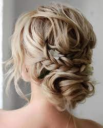 This short curly hairstyle for a wedding with the gold leaf headband makes a lovely curly bridal hairstyle. Curly Wedding Hairstyles From Playful To Chic Wedding Forward