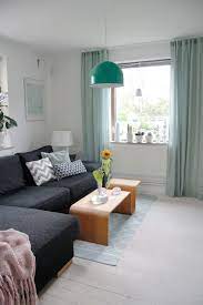Style And Whimsy Reign In This Swedish Living Room On Design Sponge Scandinavian Interior Living Room Popular Living Room Mint Living Rooms
