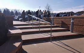We provide sales and delivery of precast products, landscaping supplies and outdoor accessories. Stainless Steel Pipe Rail At Concrete Steps Great Lakes Metal Fabrication