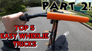TOP 5 EASY WHEELIE TRICKS / COMBOS PART 2 - YouTube
