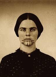 In one of the most haunting portraits of the American frontier, the 1856  photograph of **Olive Oatman** offers more than just a historical image—it  tells a story of violence, survival, and cultural