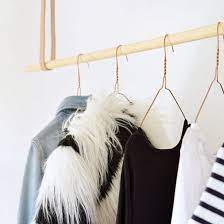 Find and follow posts tagged clothes hanger on tumblr. Build This Minimal Leather And Wood Hanging Rail In Less Than 30 Minutes Hanging Clothes Racks Diy Baby Clothes Clothing Rack