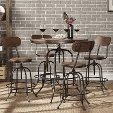 Introduce Simplicity And Transitional Functionality With This Modern Industrial Style Round Bar Table Set Offere Pub Table Sets Pub Style Table Pub Dining Set