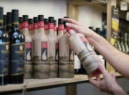 Hd00:11wine bottle popped open in colorful lights. Climate Crisis Paper Wine Bottles Designed To Reduce Emissions Go On Sale For First Time The Independent