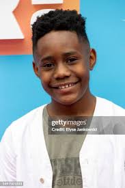 Phoenix Downing, Everett Downing, and Evelyn Downing attend The... News  Photo