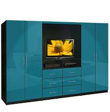 Put that space to work by installing shelves along the perimeter of your bedroom walls, which will add dozens of square feet of storage space. Aventa Tv Wardrobe Wall Unit Free Standing Bedroom Tv Unit Wardrobe Wall Tv In Bedroom Wall Unit