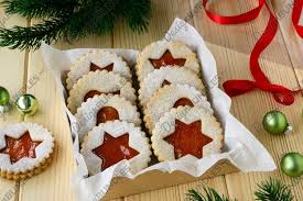 This is a delicious austrian christmas cookie recipe for amazing light and airy fairy kisses cookies. Traditional Austrian Christmas Linzer Cookies In Box 1015402 Food And Drink Design Bundles