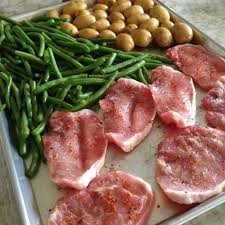 At what temperature do you cook pork chops? Baked Thin Pork Chops And Veggies Sheet Pan Dinner Eat At Home