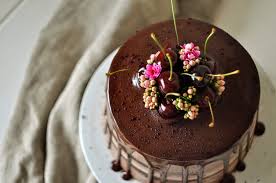 Are you looking for some tips for beginning cake decorators? Chocolate Cherry Cake Decorated With Chocolate Flowers Cherries Chocolate Cherry Cake Homemade Cakes Cake Decorating