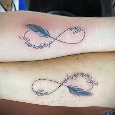 Infinity Love Friendship Tattoos On Forearm Infinity Tattoo With Feather Sister Tattoos Quotes Tattoo Quotes