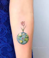 The planet earth is also the densest planet in the solar system and the largest of the four terrestrial tattoos that use images of the planet are not new in the sense that these symbols have always. Planet Earth Flower Arm Tattoo Tattoo For Girl Globe Tattoos Planet Tattoos Earth Tattoo