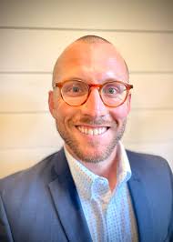 Zach Hooker, Growth and Development Director