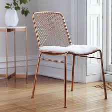 Icelandic Sheepskin Chair Cover Reviews Cb2 Dining Chairs Furniture Sheepskin Chair