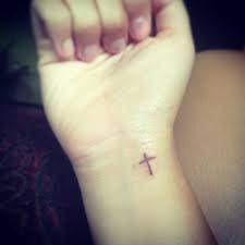 Often tattooed on the inside wrist, ankle, shoulder blade, or behind the ear, the small cross shows off your beliefs to the world, but in a delicate and not overpowering way. Small Cross Tattoos On Wrist Review At Tattoo Api Ufc Com