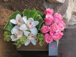 Allysonsflowers.com has been visited by 10k+ users in the past month Roses And Cymbidiums With Tropical Leaves In Santa Clarita Ca Floral Effect