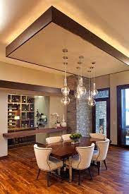 Dining rooms with ceiling details such as crown moldings dining room ceiling details. 30 False Ceiling Designs Types Ideas Materials And Lighting Systems Ceiling Design Living Room False Ceiling Living Room Dining Room Ceiling