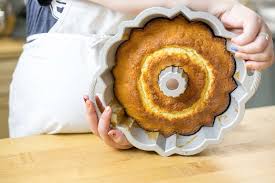 How To Unstick A Bundt Cake A Warm Buttery Perfume Fills Your Kitchen Through The Oven Window Lies A Perfect Gol In 2020 Bundt Cake Bundt Cake Pan Cooking And Baking