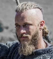 This men's hairstyle has a thick viking beard on the bottom that complements the neat sweep on top. Viking Haircut Home Facebook