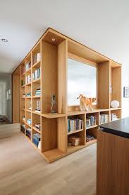 photo 11 of 13 in a california couple give a cookie cutter brooklyn residential interior home shelves