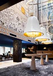 Marcel wanders cuts a tall, dashing figure with his leonine mane of hair and black suit. Andaz Amsterdam Prinsengracht Hotel By Marcel Wanders
