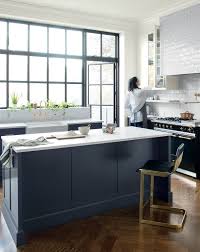 This modern dark walnut slab cabinet door is paired with julep tile. These Are The Best Paint Colors Of 2019 For Your Kitchen Martha Stewart