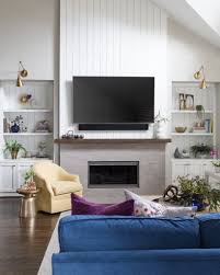 Upgrade to a smart tv with art or the frame tv. How To Decorate A Mantel When You Have A Tv Above It Designed
