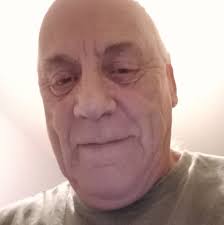 Still covering the road and a few people driving through